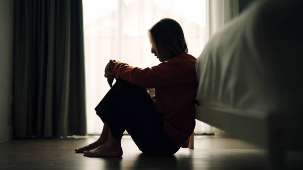 In silhouette of woman sad depression in bedroom. In silhouette of woman sad depression in bedroom.
